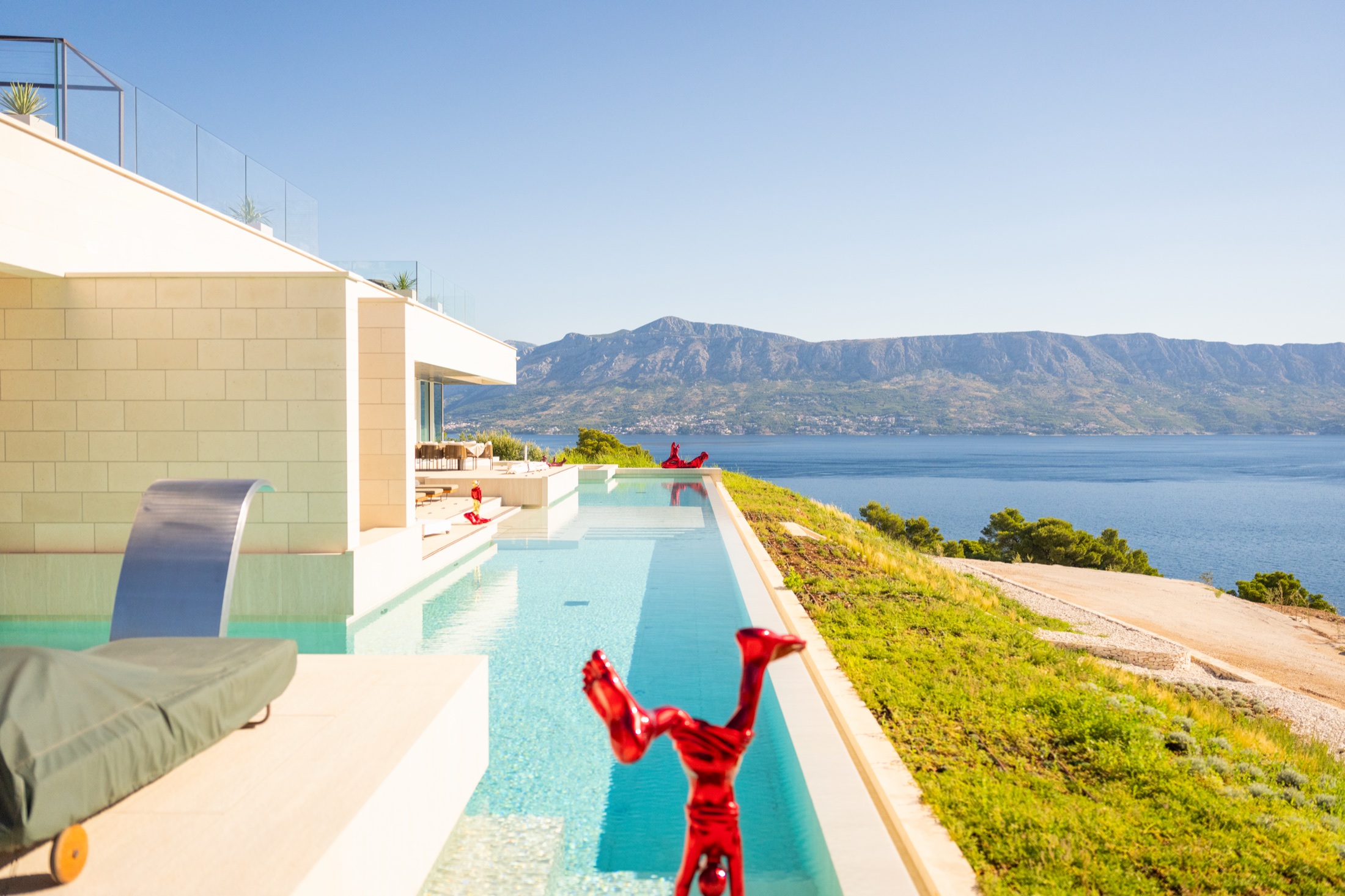 Villa Perez and its long infinity pool above the sea