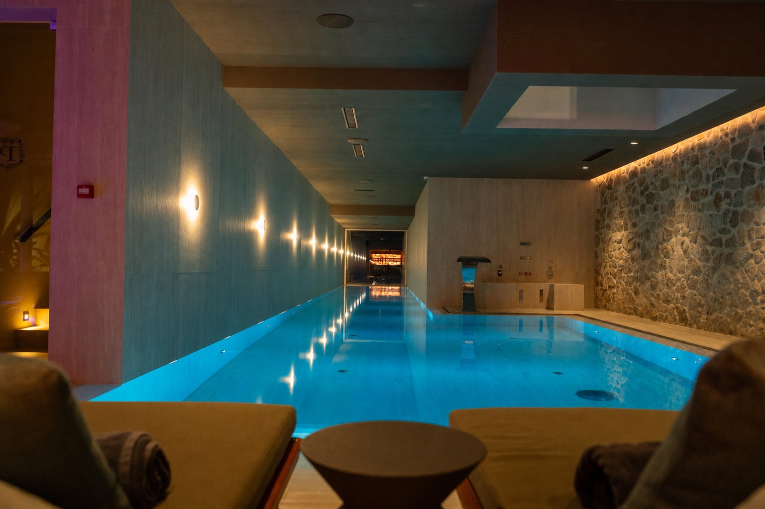 Atmospheric indoor wellness pool at Villa Perez