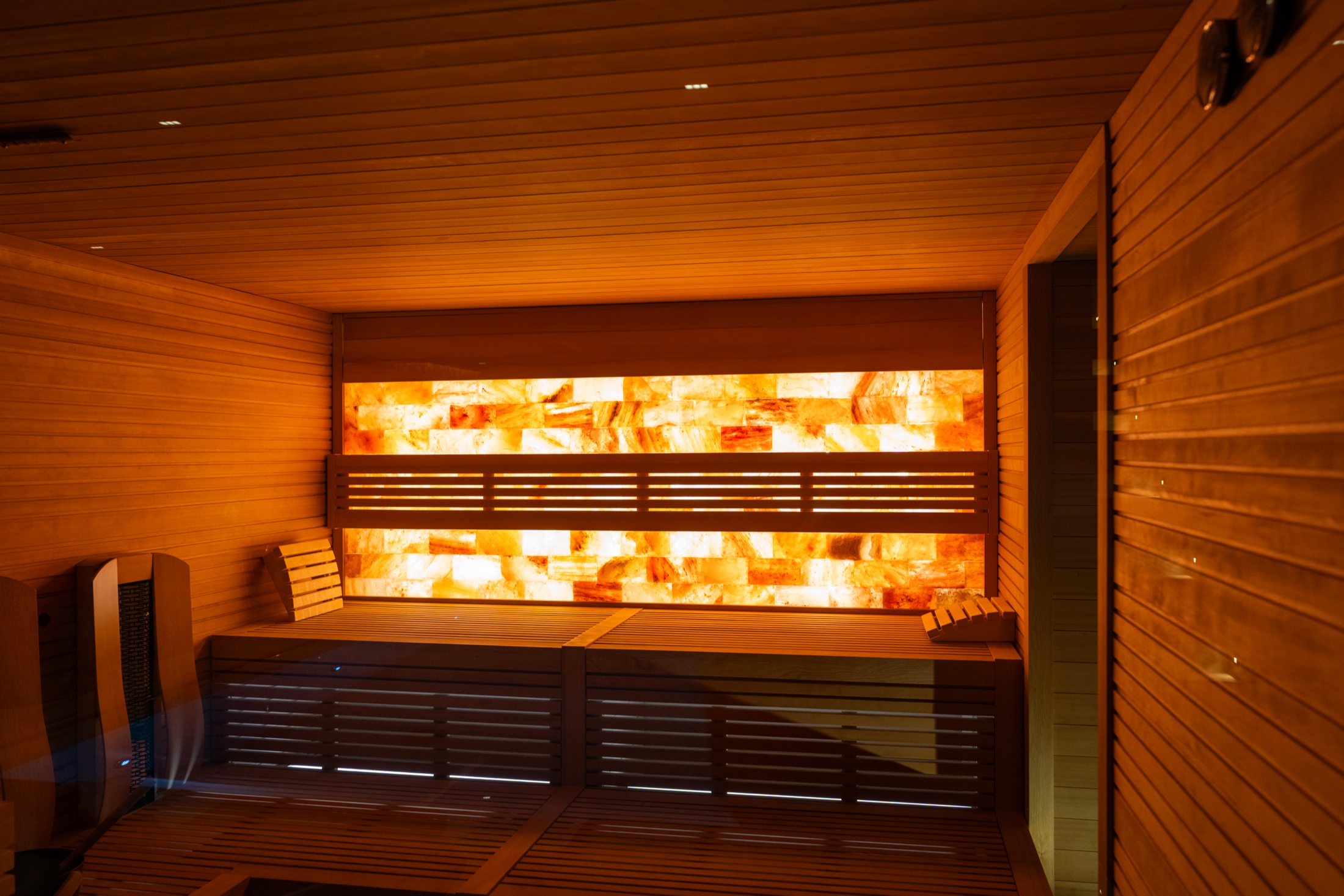Private sauna with glowing mineral wall